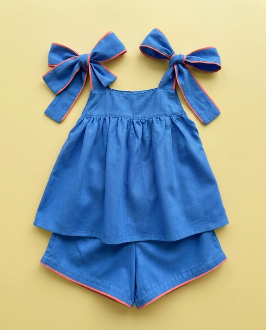 Conjunto azul com laços - foto 1